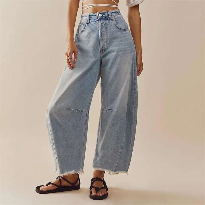L'AURABLEND JEANS MED HÖG MIDJA OCH UTSVÄNGD DENIM