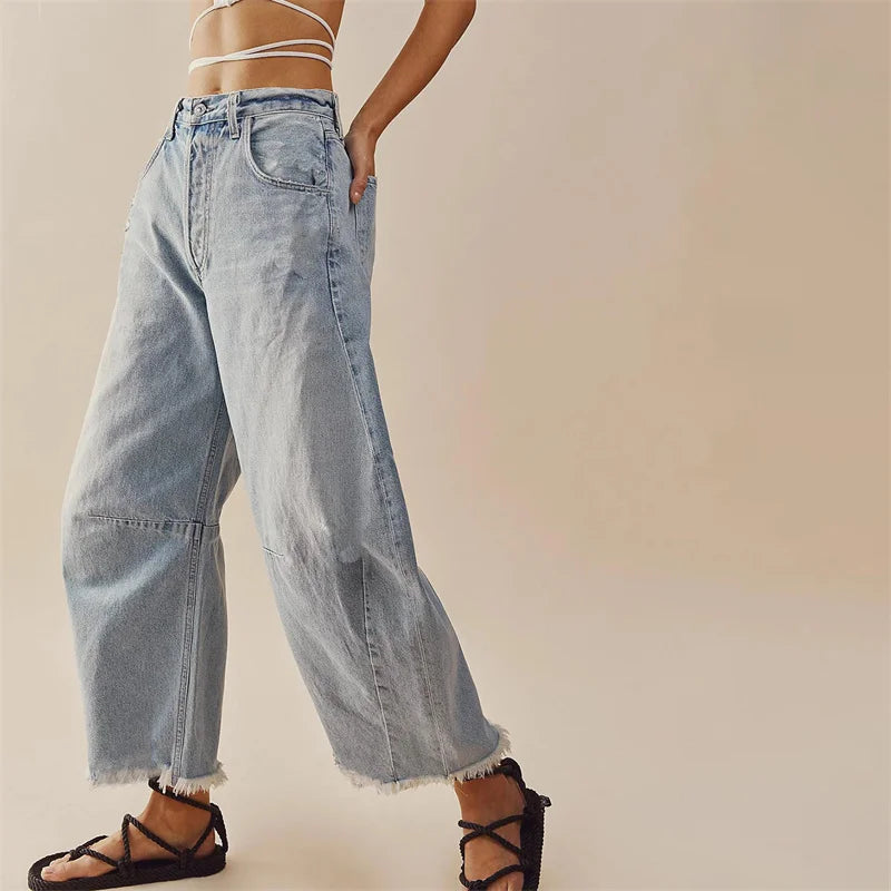 L'AURABLEND JEANS MED HÖG MIDJA OCH UTSVÄNGD DENIM